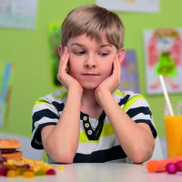 39791012 - boy having choice - healthy or unhealthy lunch